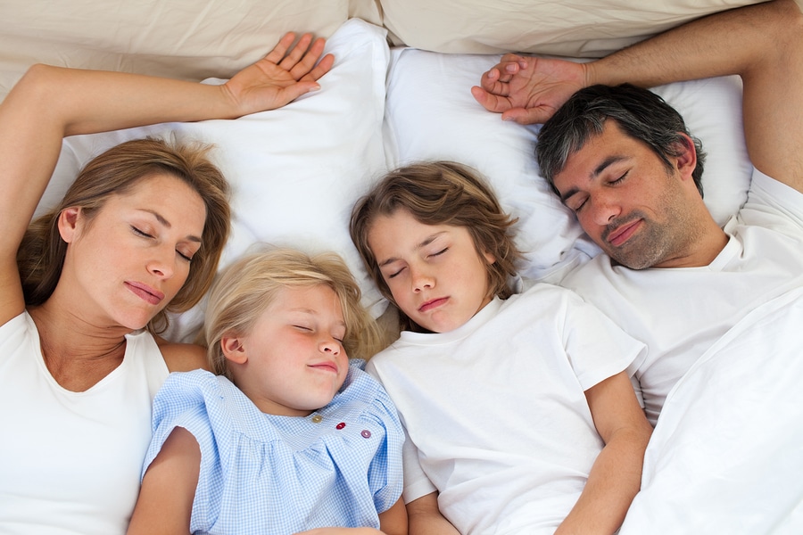 Bigstock Loving Family Sleeping Togethe 6889260 